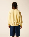 NP - SUN-KISSED CREWNECK YELLOW - BACKSTAGE - باك ستيج - BACKSTAGE باك ستيج your go-to destination for discovering the finest brands that cater to every taste and occasion in KSA and Middle East.