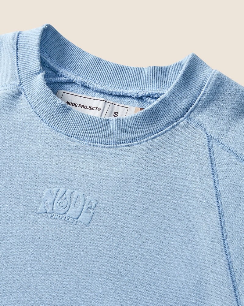 NP - SUN-KISSED CREWNECK CELESTE - BACKSTAGE - باك ستيج - BACKSTAGE باك ستيج your go-to destination for discovering the finest brands that cater to every taste and occasion in KSA and Middle East.