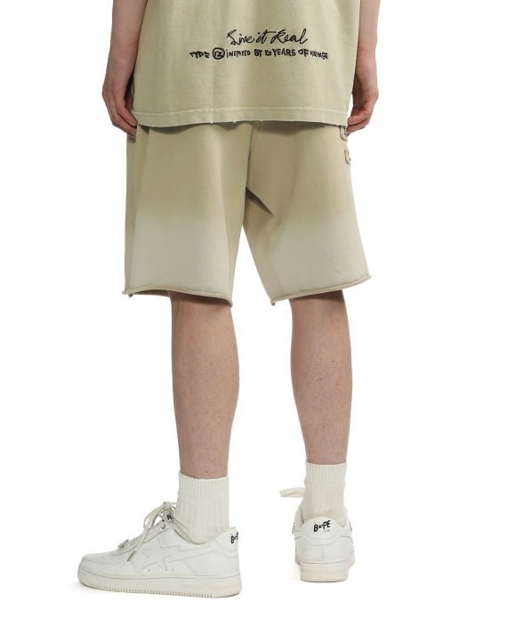 IZZUE - Spray distress shorts beige - BACKSTAGE - باك ستيج - BACKSTAGE باك ستيج your go-to destination for discovering the finest brands that cater to every taste and occasion in KSA and Middle East.